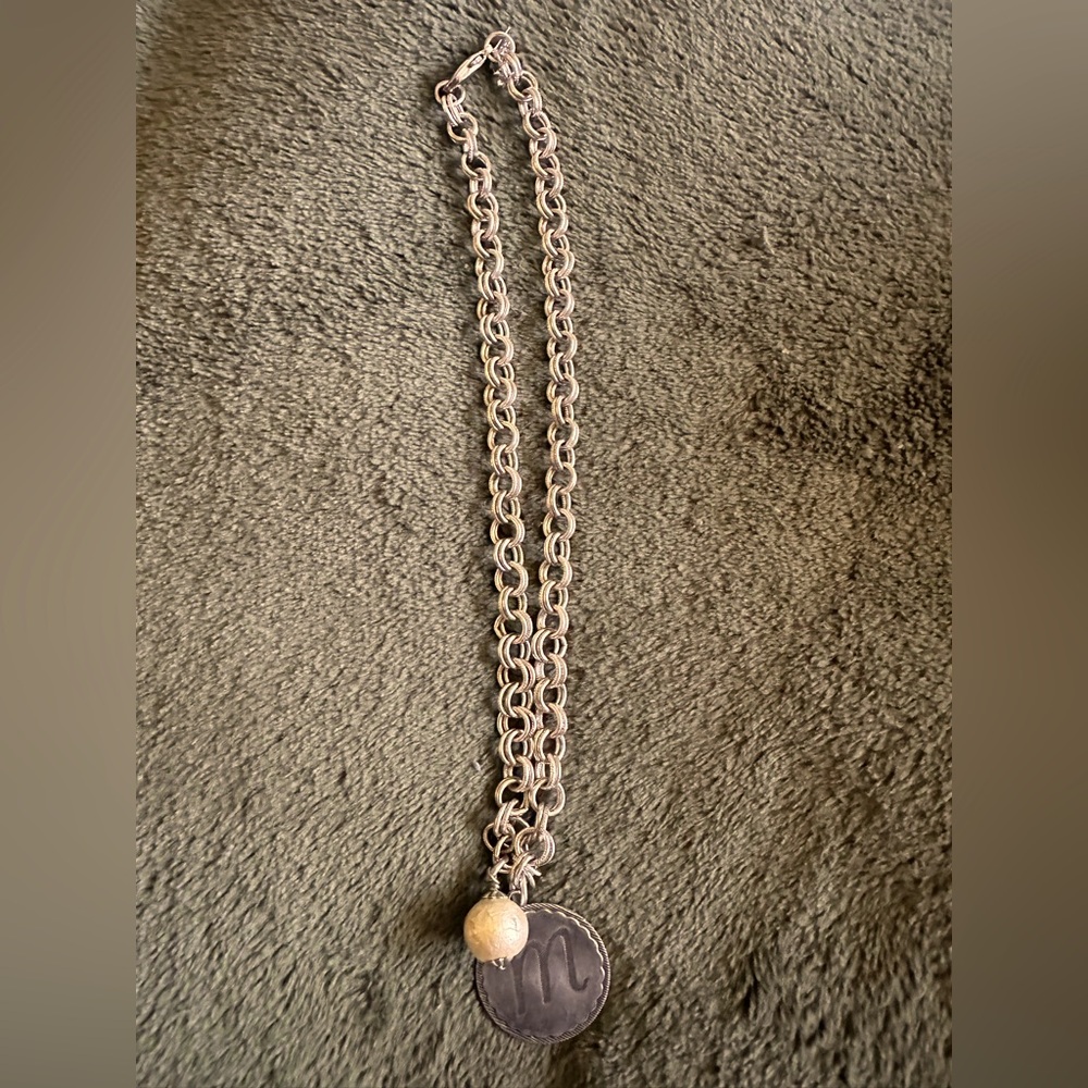 Silver Chain Necklace with M initial and cotton charm. From John Wind. Antique.